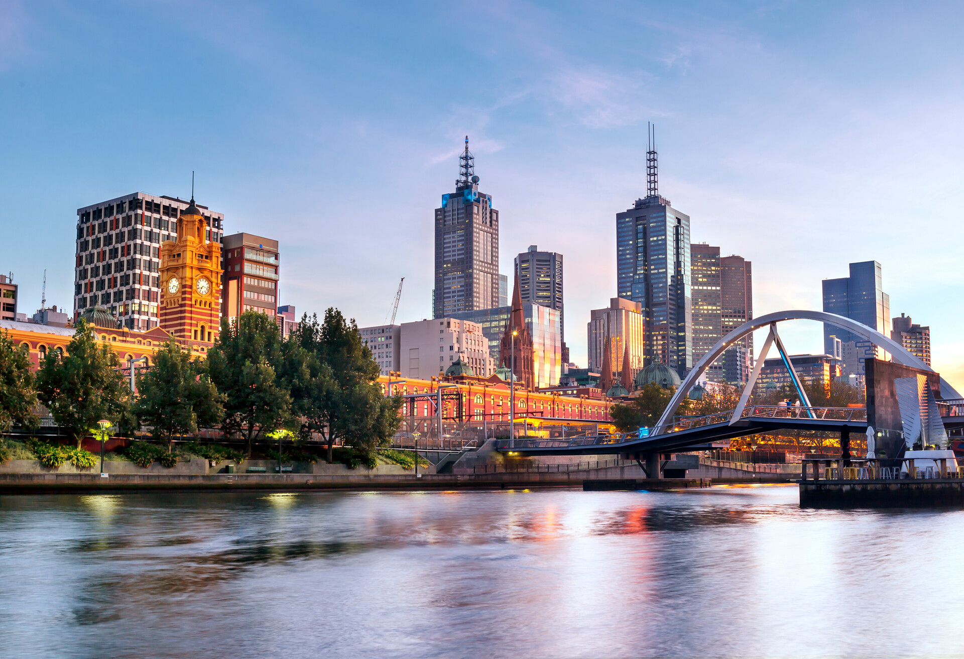 Melbourne, Australia, in early morning light.  Yarra River, towards Flinders Street Station.