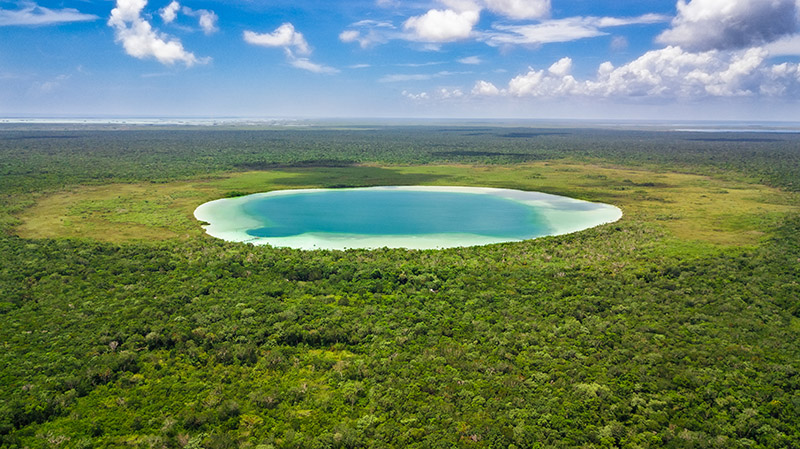 Drone view of the hidden treasure Kaan Luum lagoon in Tulum Quintana Roo, Mexico