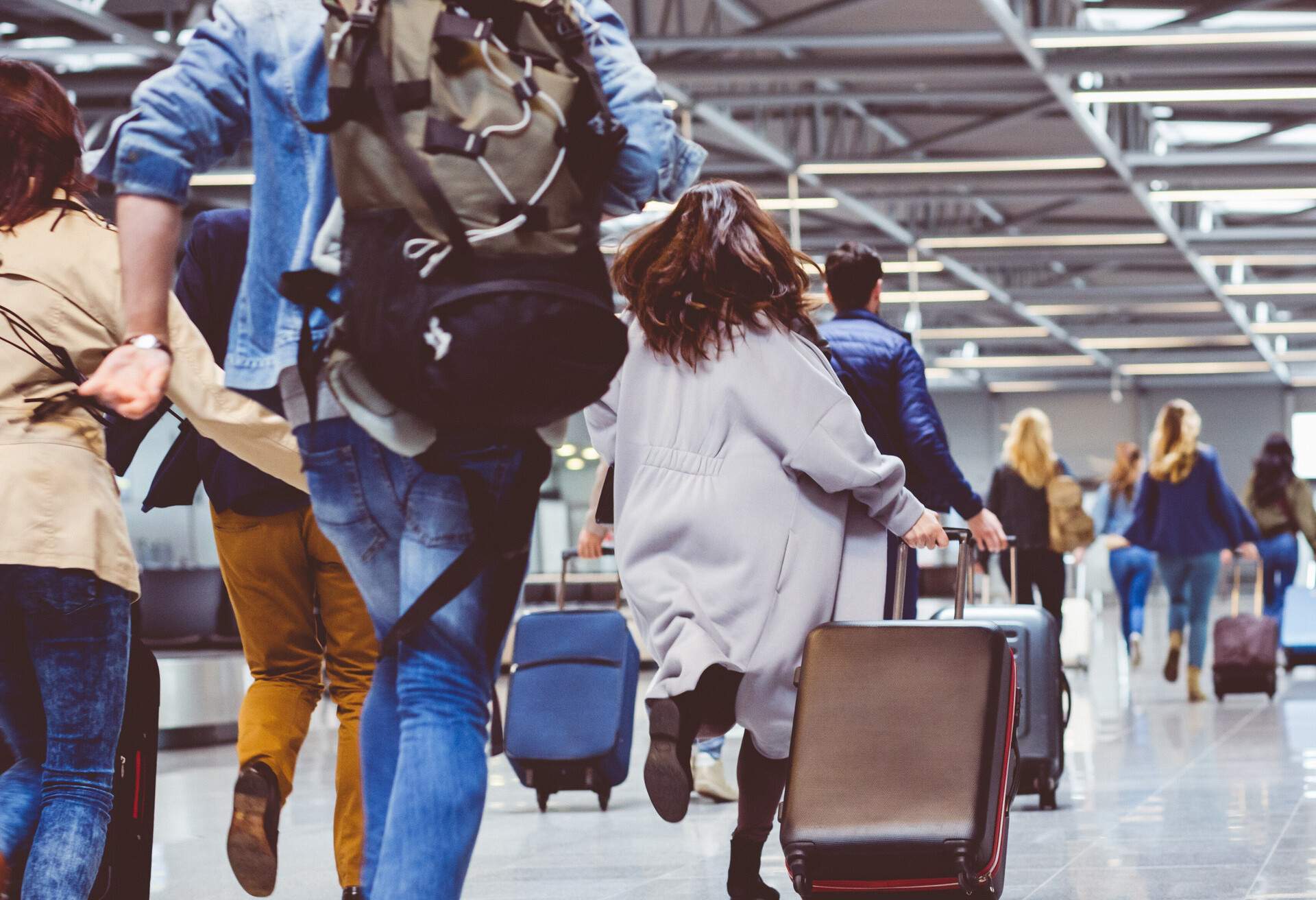 People running to catch a flight