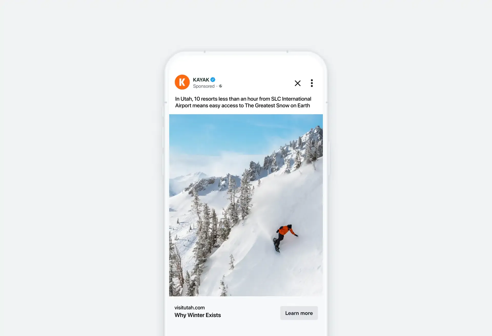 Skier in snowy mountains shown on travel app promoting winter destinations.