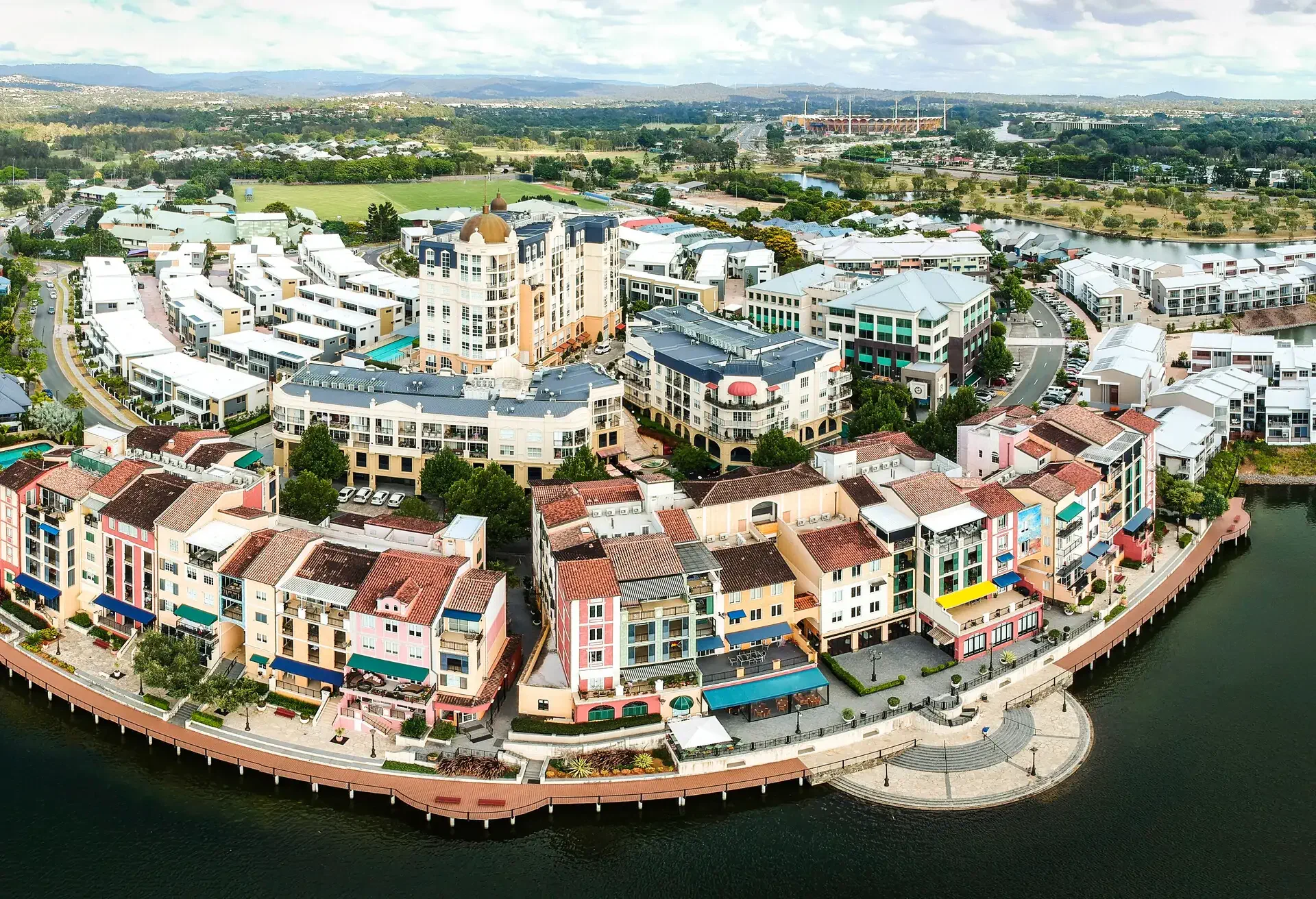 The residential area known as Emerald Lakes comprises of apartments and villages along the banks of Clear Island lake, a series of waterways near the Gold Coast, Queensland, Australia. The colourful buildings of the Porto Bellago village resemble an Italian style port and is home to many retired Australians with a passion for all things European.