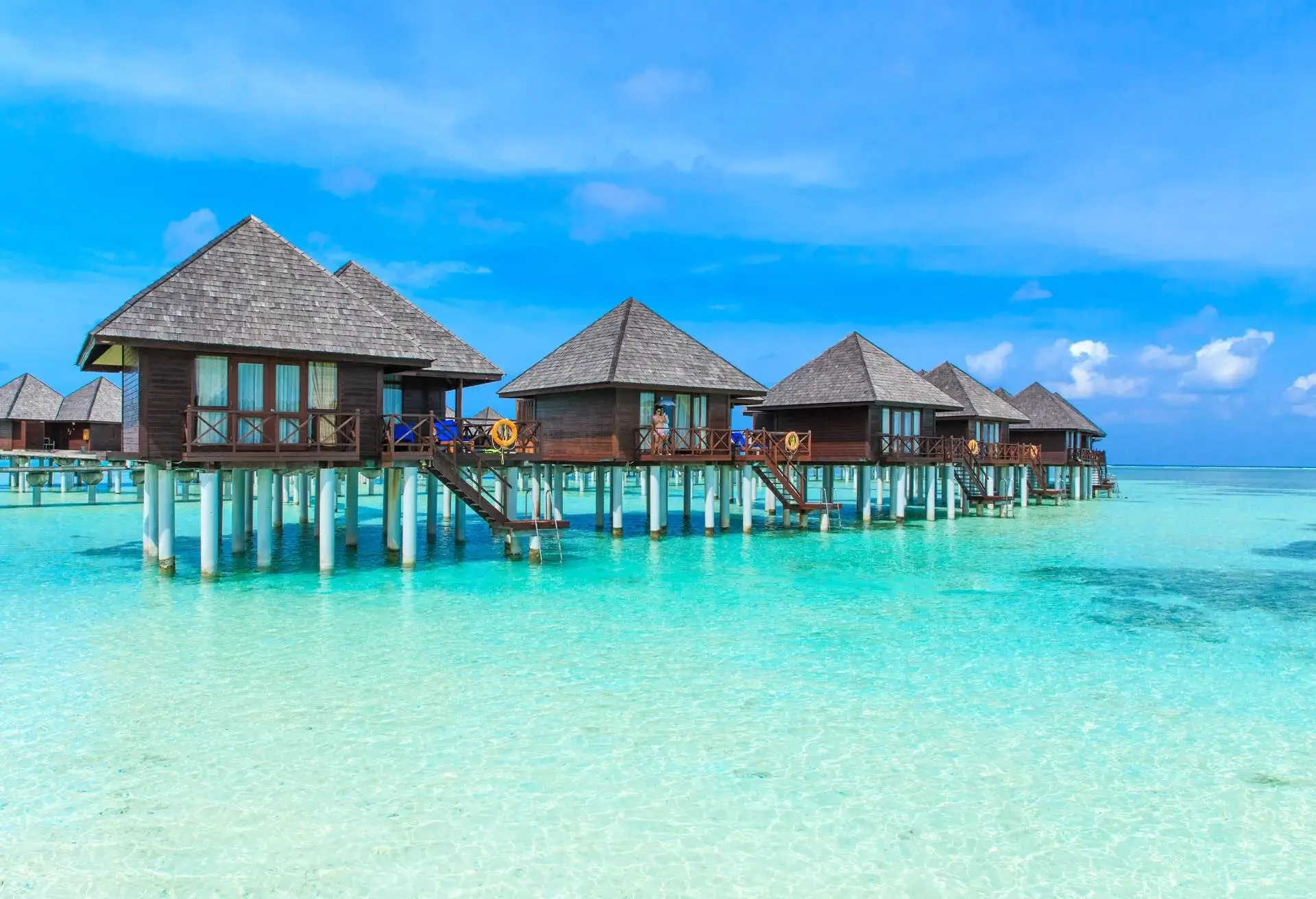 beach with water bungalows at Maldives..; Shutterstock ID 553299517; Purpose: Maldives; Brand (KAYAK, Momondo, Any): Both