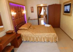ApartHotel Dom - Odessa - Bedroom