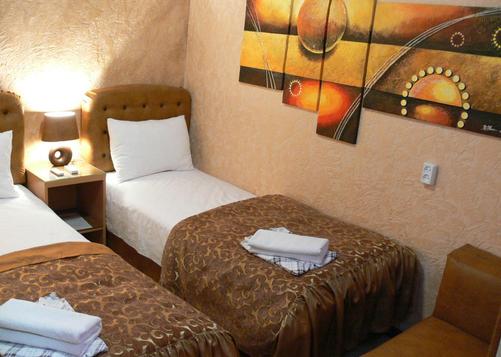 ApartHotel Dom - Odessa - Bedroom