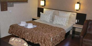ApartHotel Dom - Odessa - Bedroom