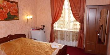 ApartHotel Dom - Odessa - Bedroom